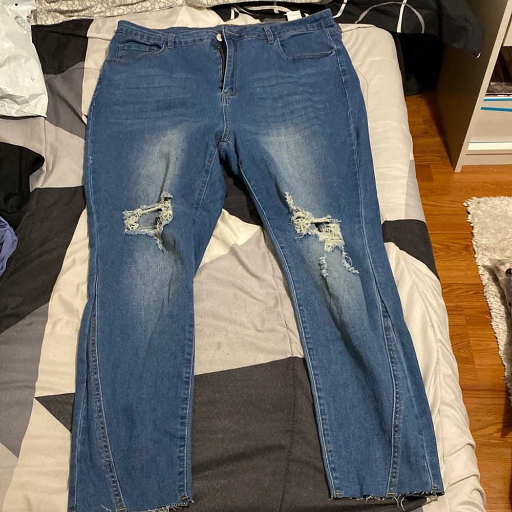 Ripped blue jeans